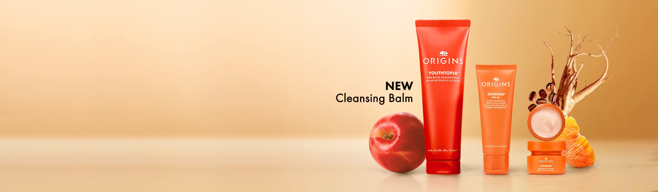 Selection of Origins minis on a soft grey concrete plinth, in a bright setting